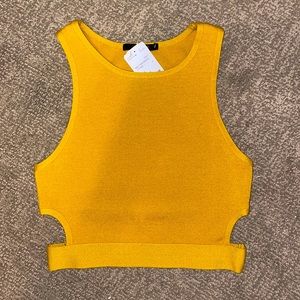 Mustard yellow cropped sweater.